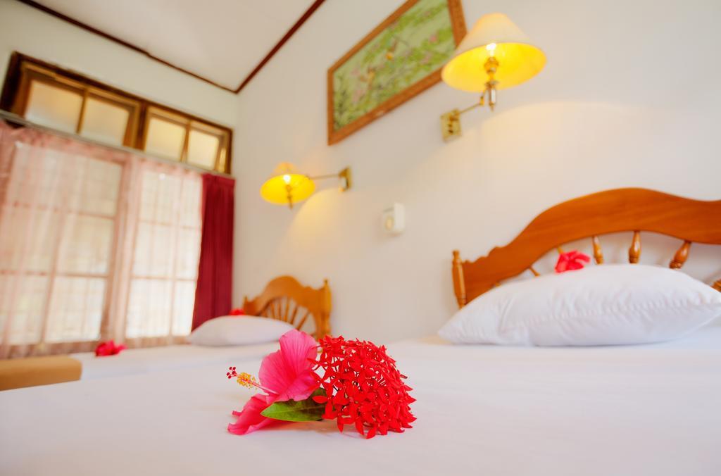 Hotel Angsoka Temukus Quarto foto